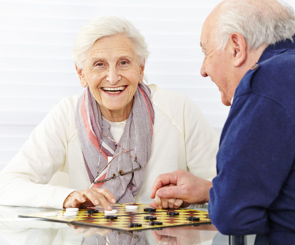 Checkerboard Tables Two Seniors Playing Checkers | Heritage Waterside Checkerboard Tables