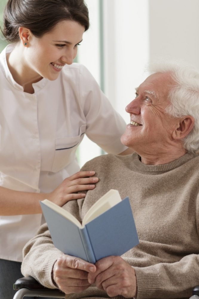 Carousel Photo 6 Nurse Talking To A Resident | Heritage Waterside Nurse Talking To A Resident